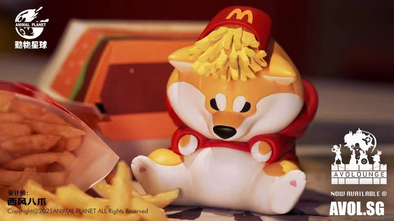 Animal Planet - Corgi in McDonald cape fast food