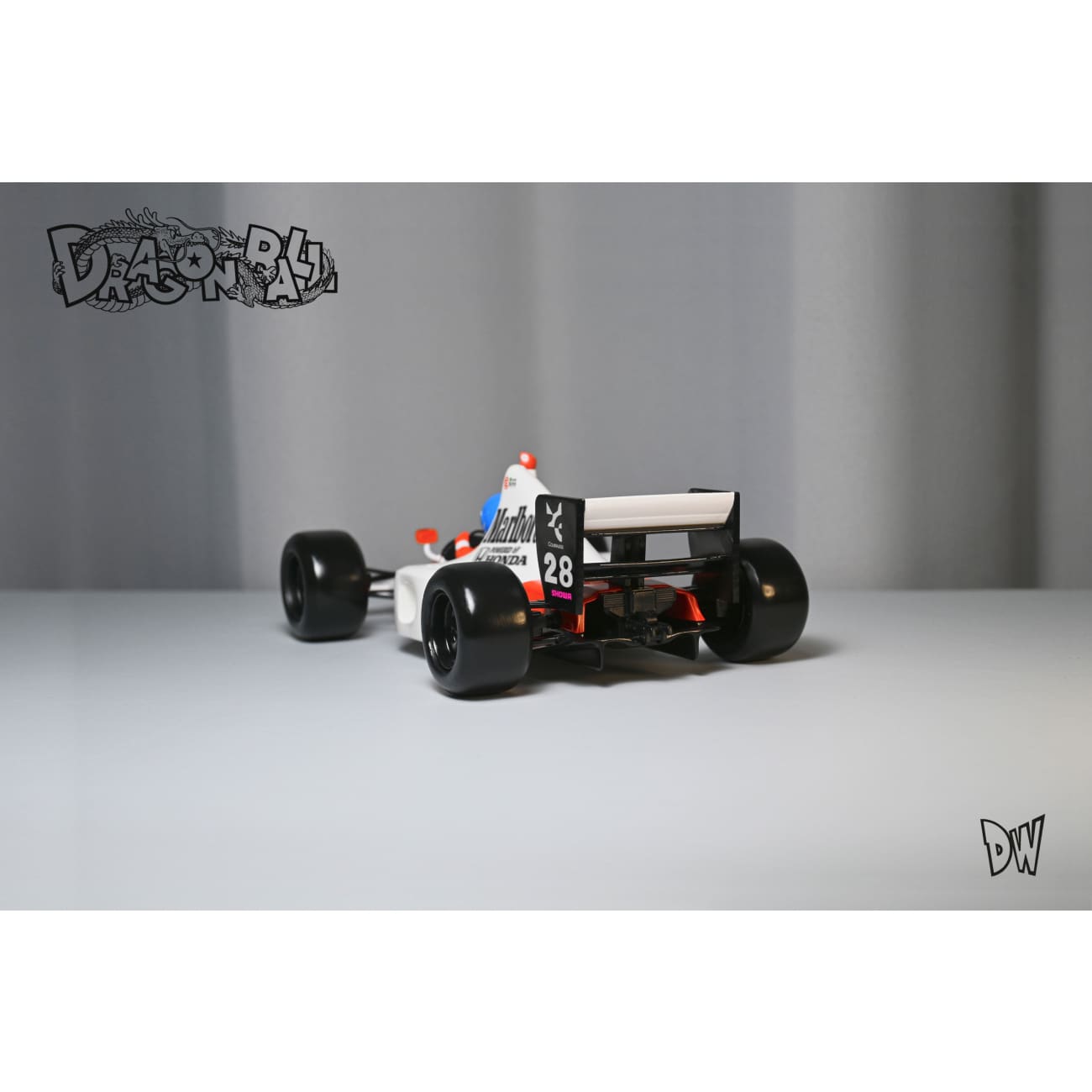 Dw Studio - Title Page F1 Car Racing Son Goku [2 Variants] – Avolounge