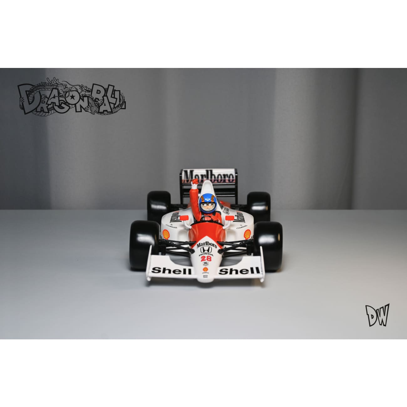 Dw Studio - Title Page F1 Car Racing Son Goku [2 Variants] – Avolounge